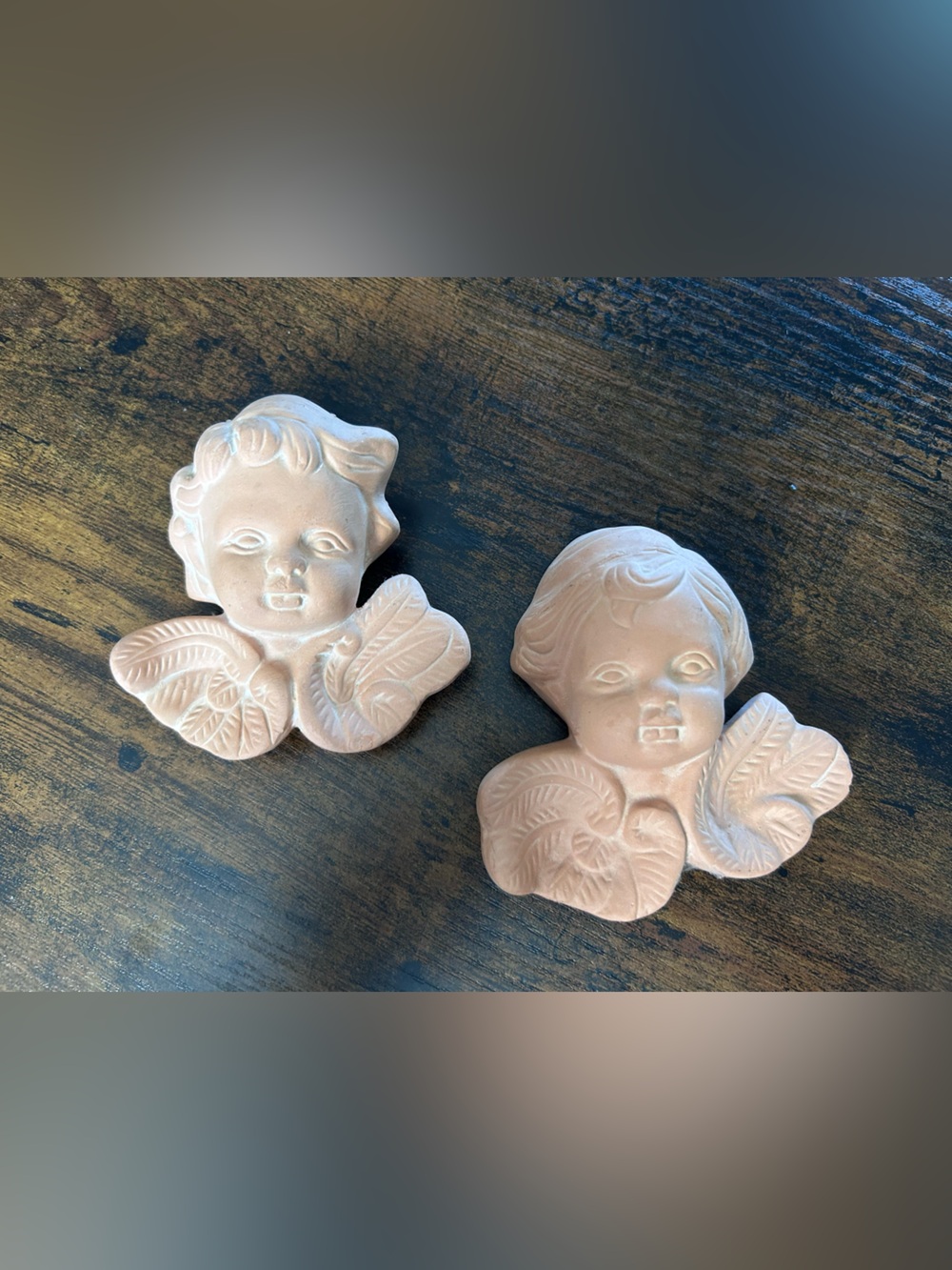 2 unglazed terracotta angel or cherub figurine wall plaque garden decor